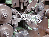 Automatic coiling machinery